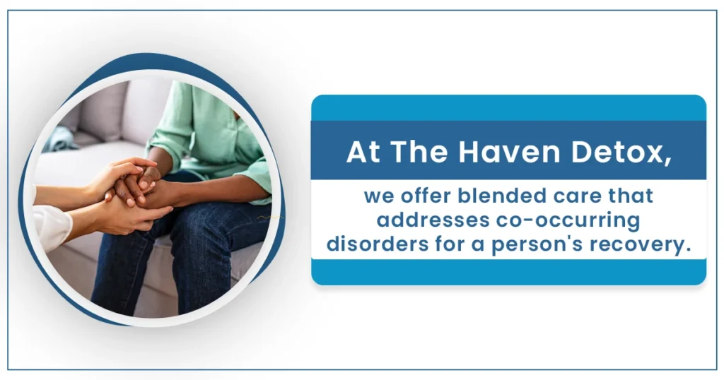 A woman holds another woman’s hands in hers, reassuringly. At The Haven Detox we offer blended care that addresses co-occurring disorders.